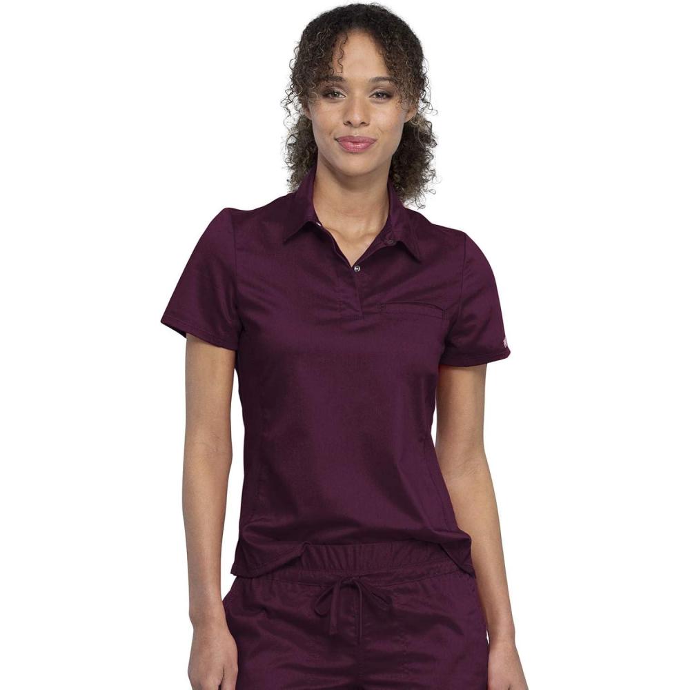 imageCherokee Scrubs for Women Polo Top Snap Front Tuckable Scrub Shirt with Chest Pocket Mesh Panels Stretch Easy Care WW698Wine