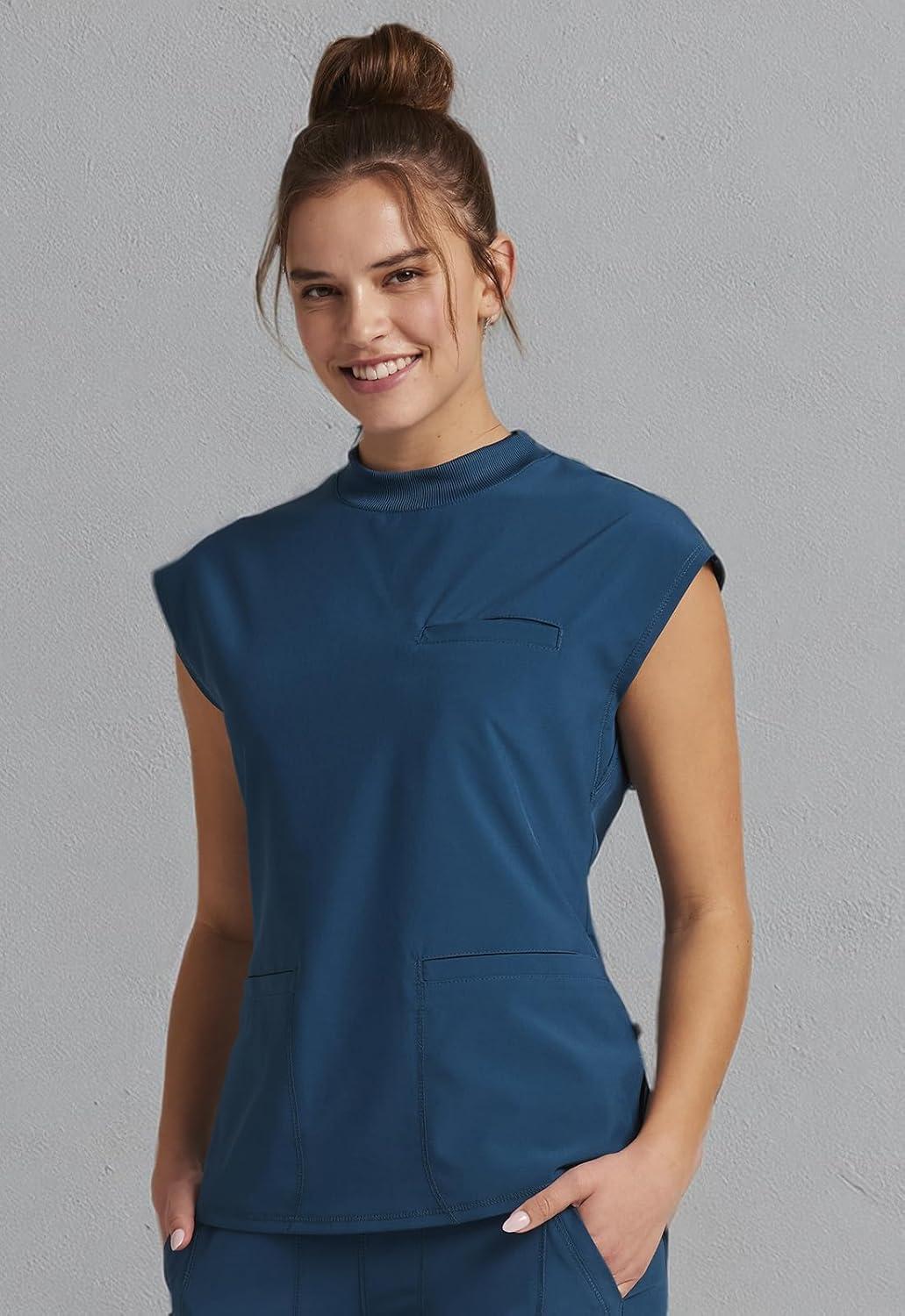 imageCherokee Infinity Womens Mock Neck Scrub Top 4 Pockets Dolman Sleeves RibKnit Back Panel Stylish Medical Top CK742ACaribbean Blue