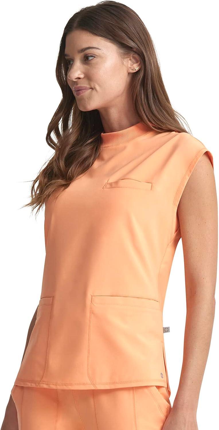 imageCherokee Infinity Womens Mock Neck Scrub Top 4 Pockets Dolman Sleeves RibKnit Back Panel Stylish Medical Top CK742APeach Linen
