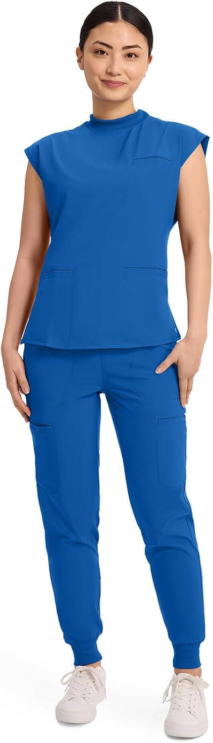 imageCherokee Infinity Womens Mock Neck Scrub Top 4 Pockets Dolman Sleeves RibKnit Back Panel Stylish Medical Top CK742ARoyal