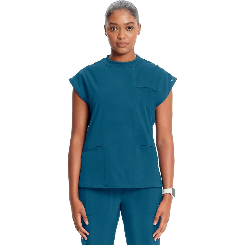imageCherokee Infinity Womens Mock Neck Scrub Top 4 Pockets Dolman Sleeves RibKnit Back Panel Stylish Medical Top CK742ACaribbean Blue