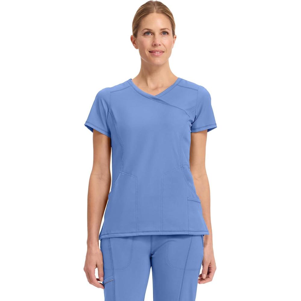 imageCherokee Infinity Womens Mock Wrap Scrub Top 4 Pockets RibKnit Panel MoistureWicking 360 Stretch 2625ABlue