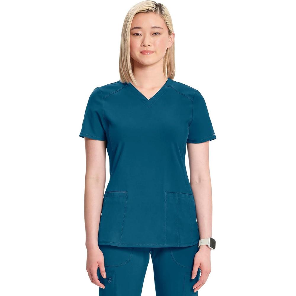 imageCherokee Infinity Womens VNeck Scrub Top Contemporary Fit 2 Pockets RibKnit Insert Side Vents 360 Stretch CK865ACaribbean Blue