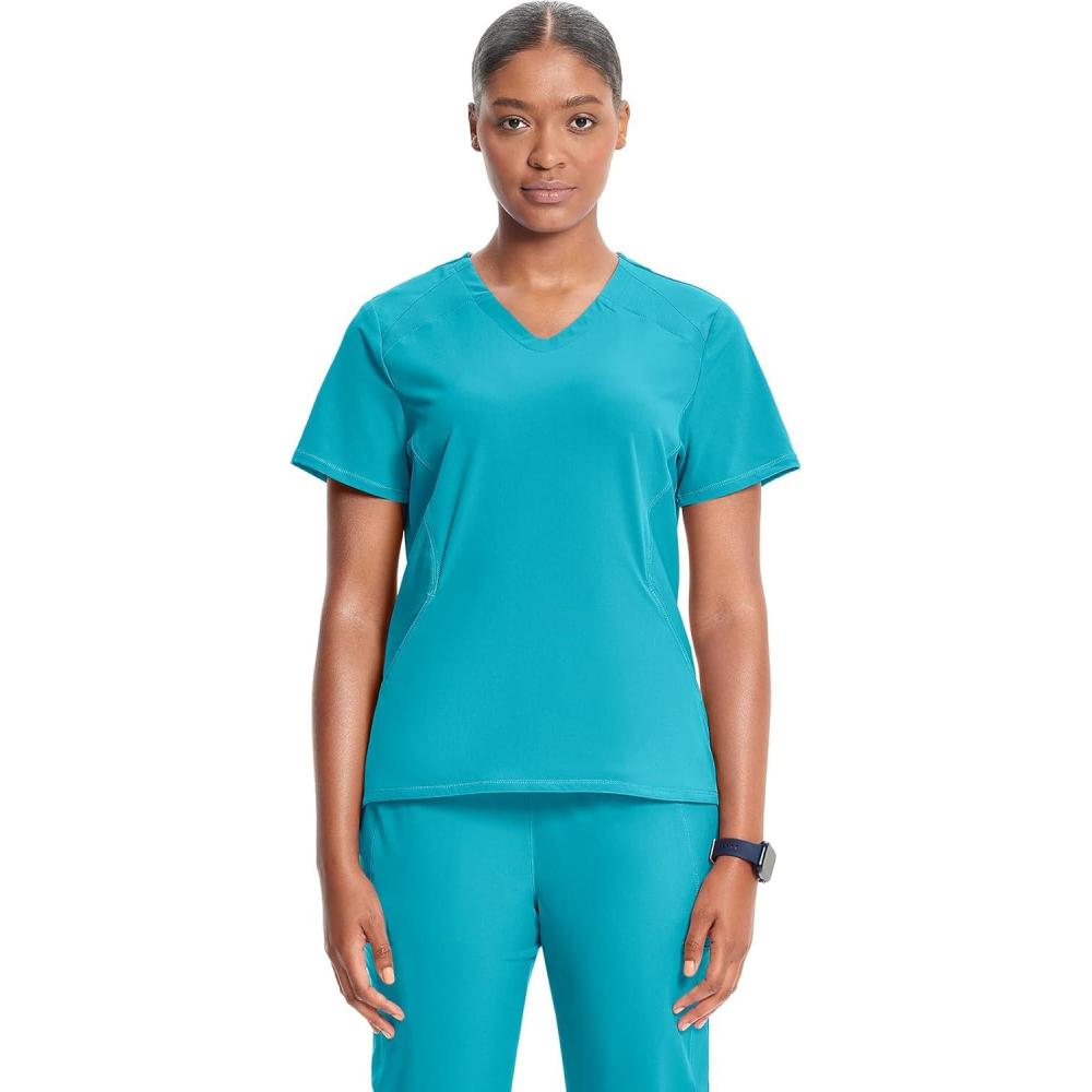 imageCherokee Infinity Womens VNeck Scrub Top Kangaroo Pocket HighLow Hem RibKnit Panels amp PROTX2 Technology IN620AAquaturque