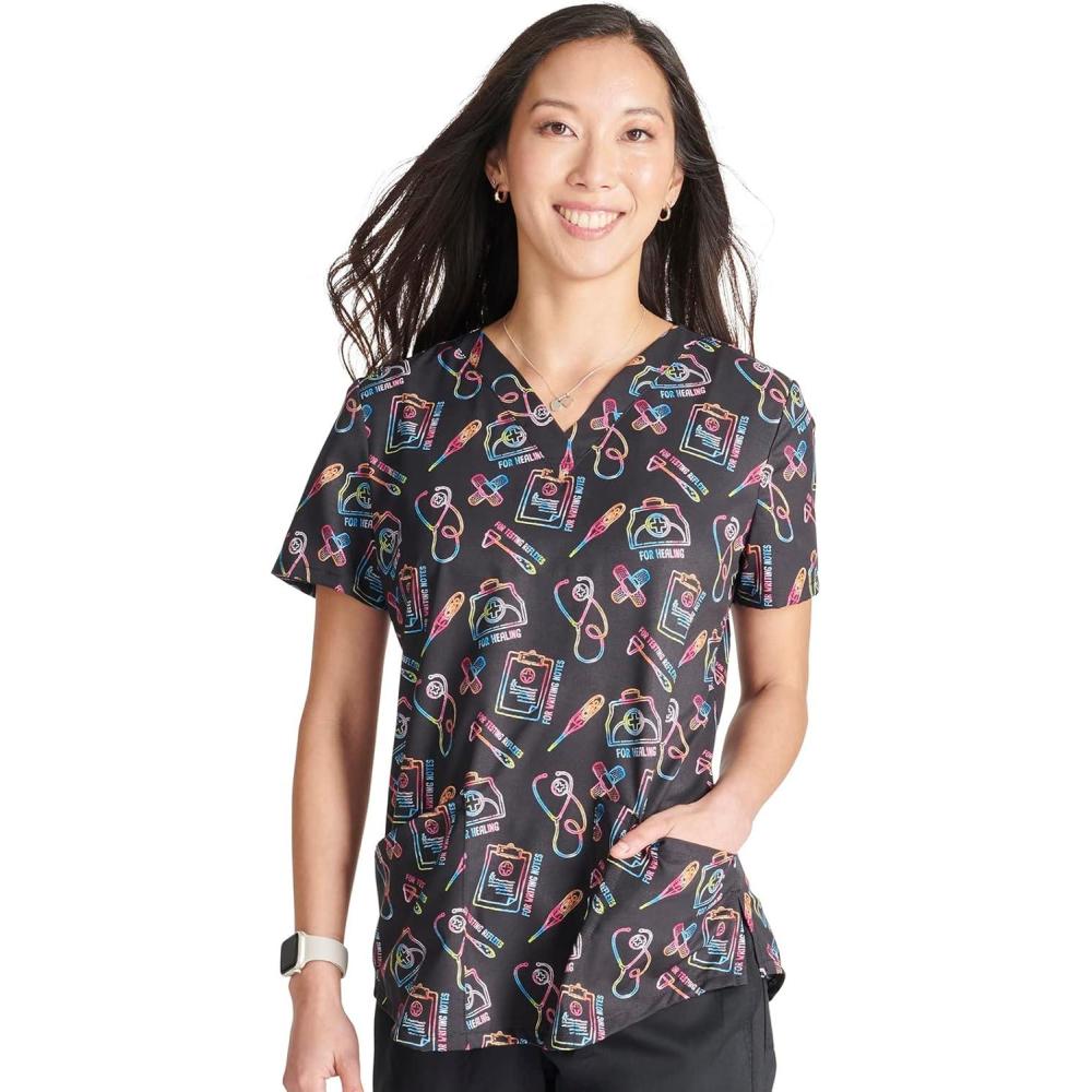 imageCherokee Scrubs for Women VNeck Printed Scrub Top Modern Classic Fit with 3 Pockets Shaping Darts amp Side Vents CK664Caring Essentials