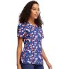 Cherokee Infinity Womens V-Neck Print Scrub Top with 2 Pockets, Rib-Knit Insert Logo O-Ring Detail & Shirttail Hem – CK634(Sporty Spots)
