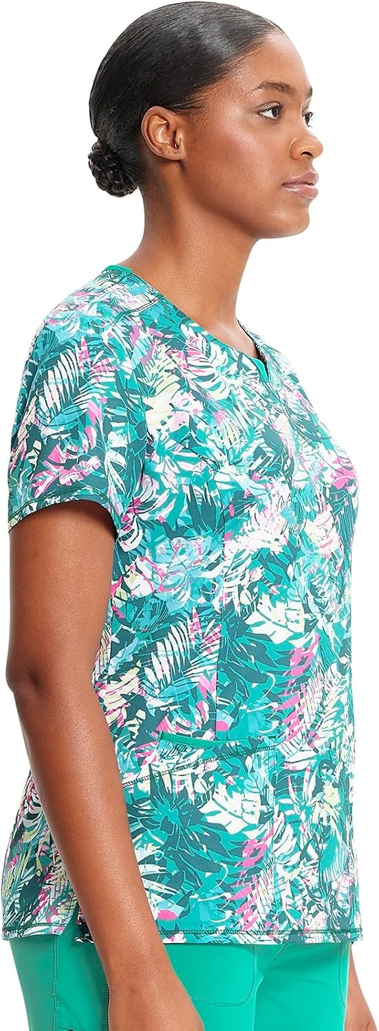 image:imageCherokee Infinity Printed Scrub Tops for Women Round Neck 3 Pockets Comfortable Fit Stretch Fabric Coverstitch Detailing Rib Knit Neckline Inset Princess Seams Side Vents Easy CareTropic Texture